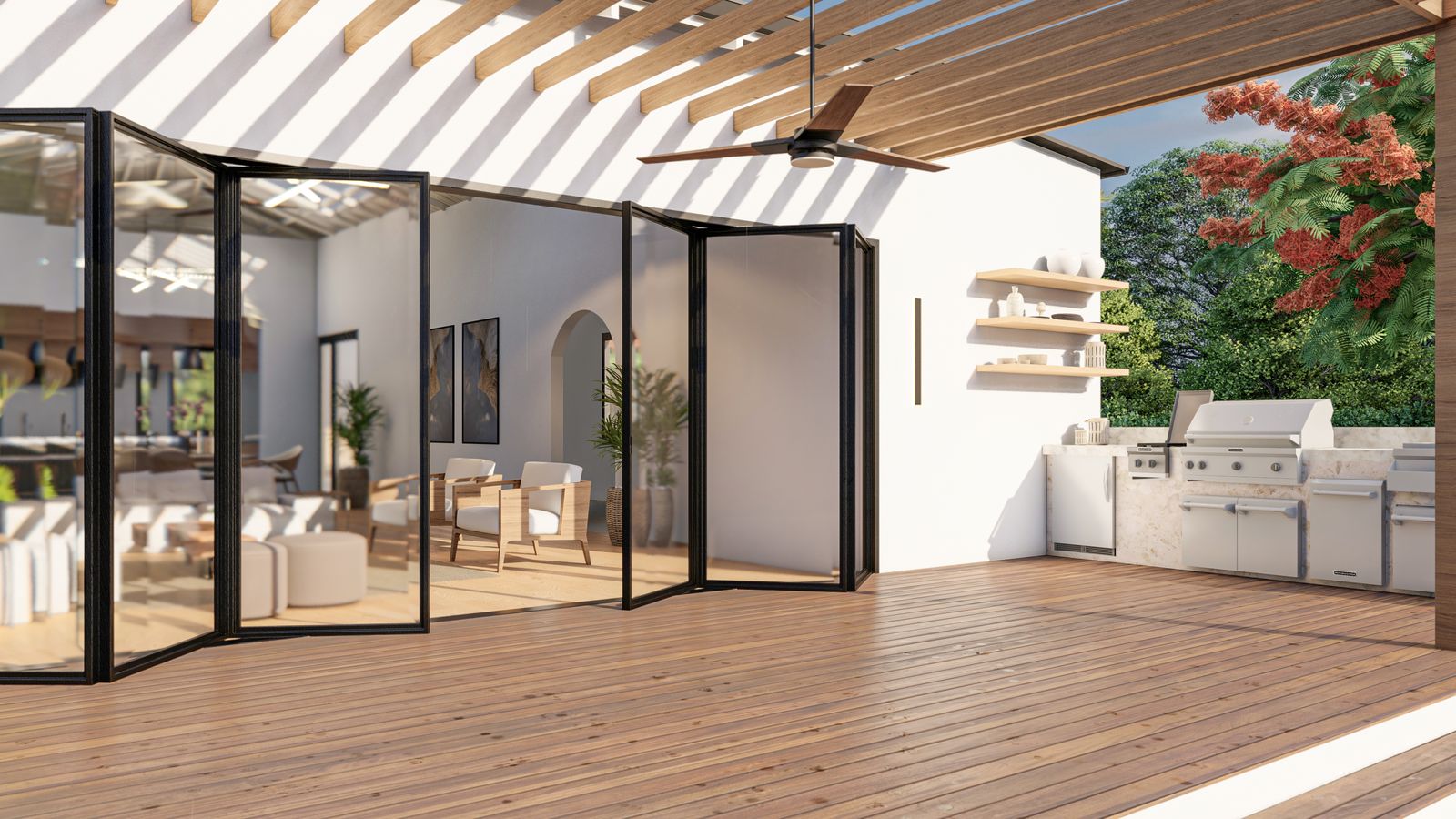 Folding glass wall opened fully to the deck and outdoor kitchen